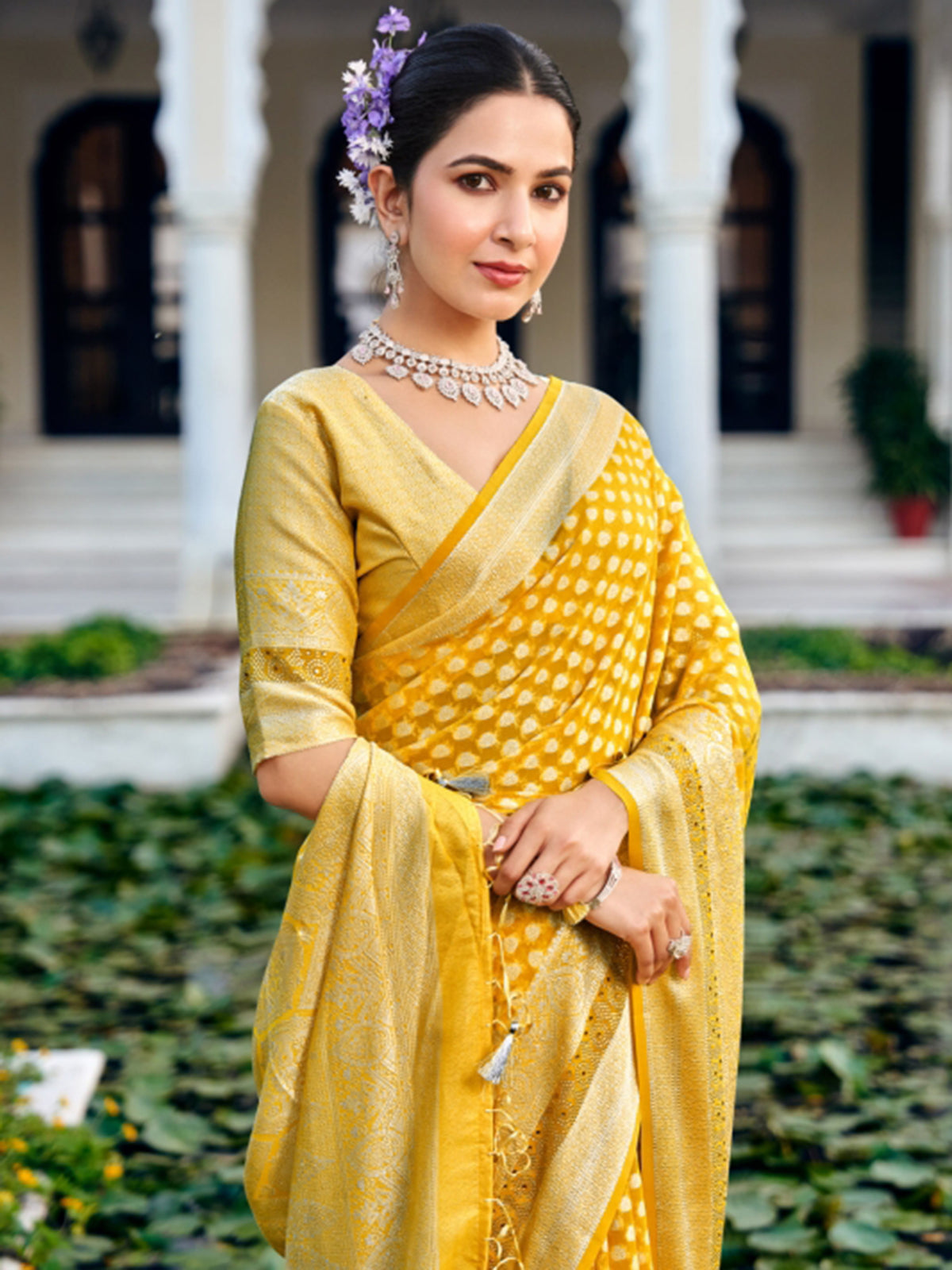 Yellow georgette saree with zari