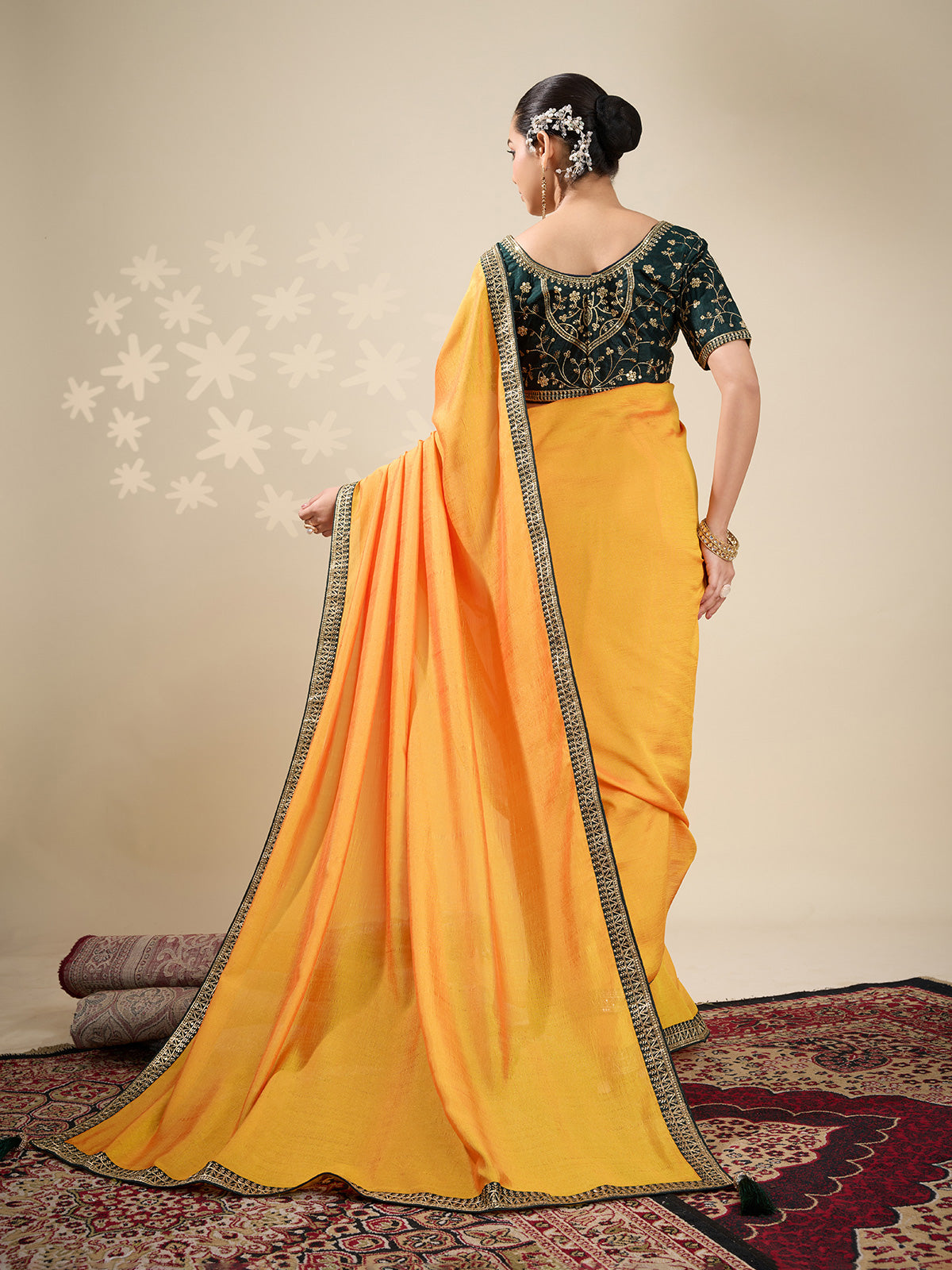 Yellow plain silk saree with green blouse