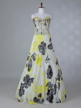 Yellow satin silk lehenga choli with floral print