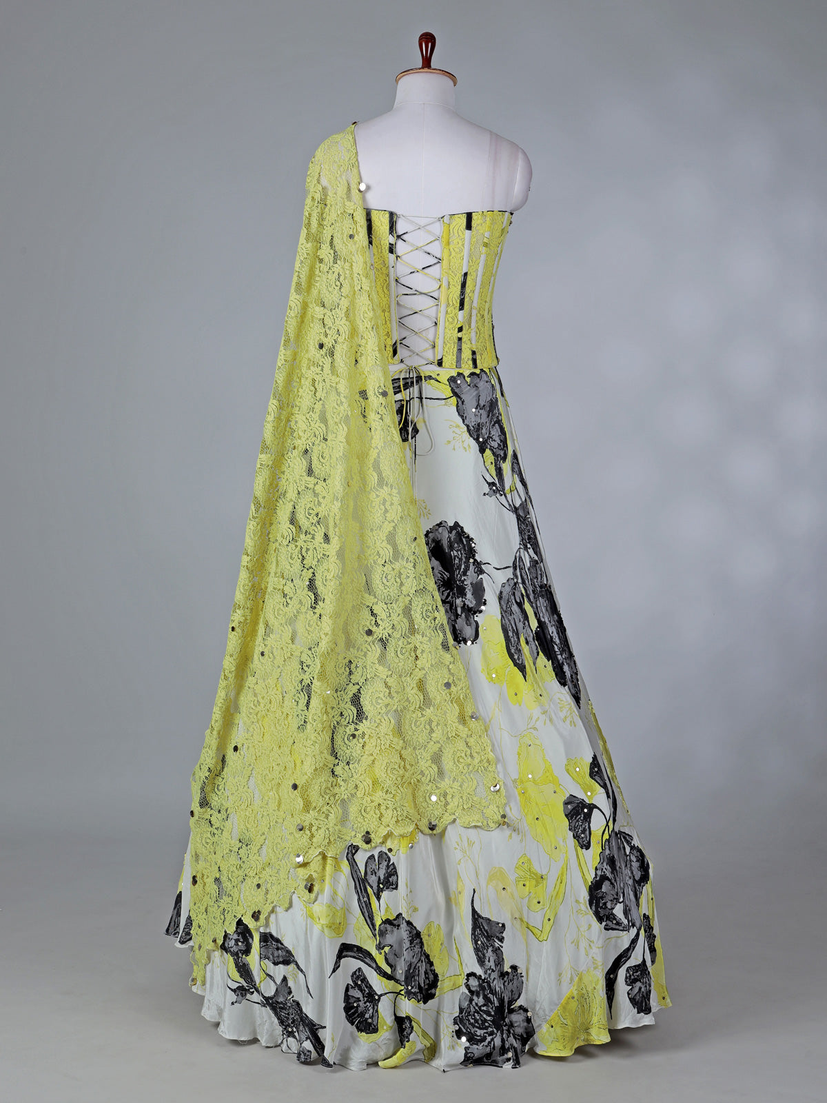 Yellow satin silk lehenga choli with floral print
